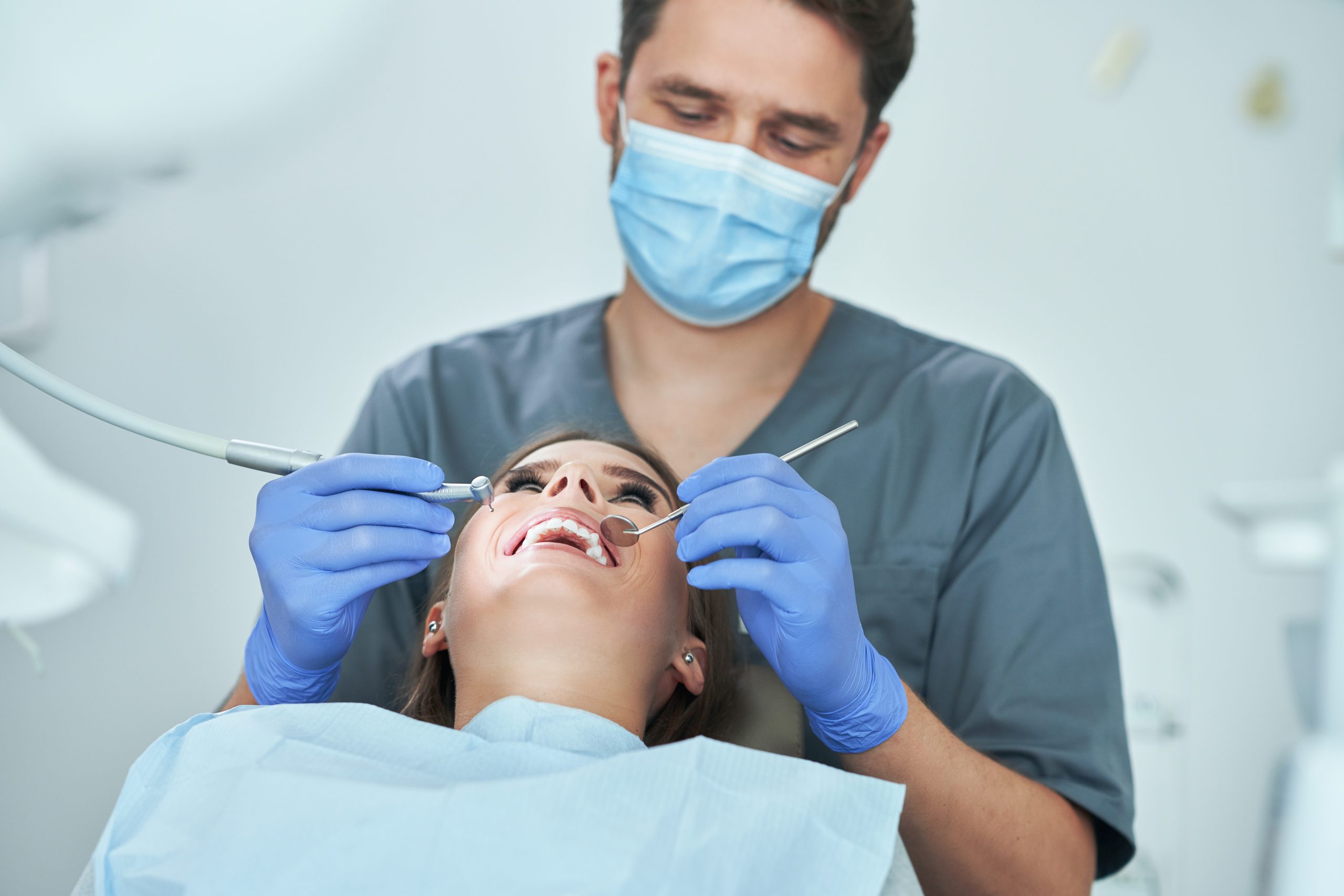male dentist and woman in dentist office 2022 05 13 01 37 11 utc scaled